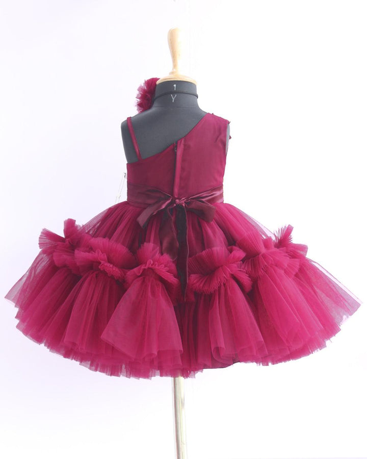 Grapevine Pleated Ruffled Birthday Frock.
Material: Aishu's Purple Shade Pleated Ruffled Frock mono net with layered and ruffles on the end portion. Yoke portion is designed with pleated pattern and a handw