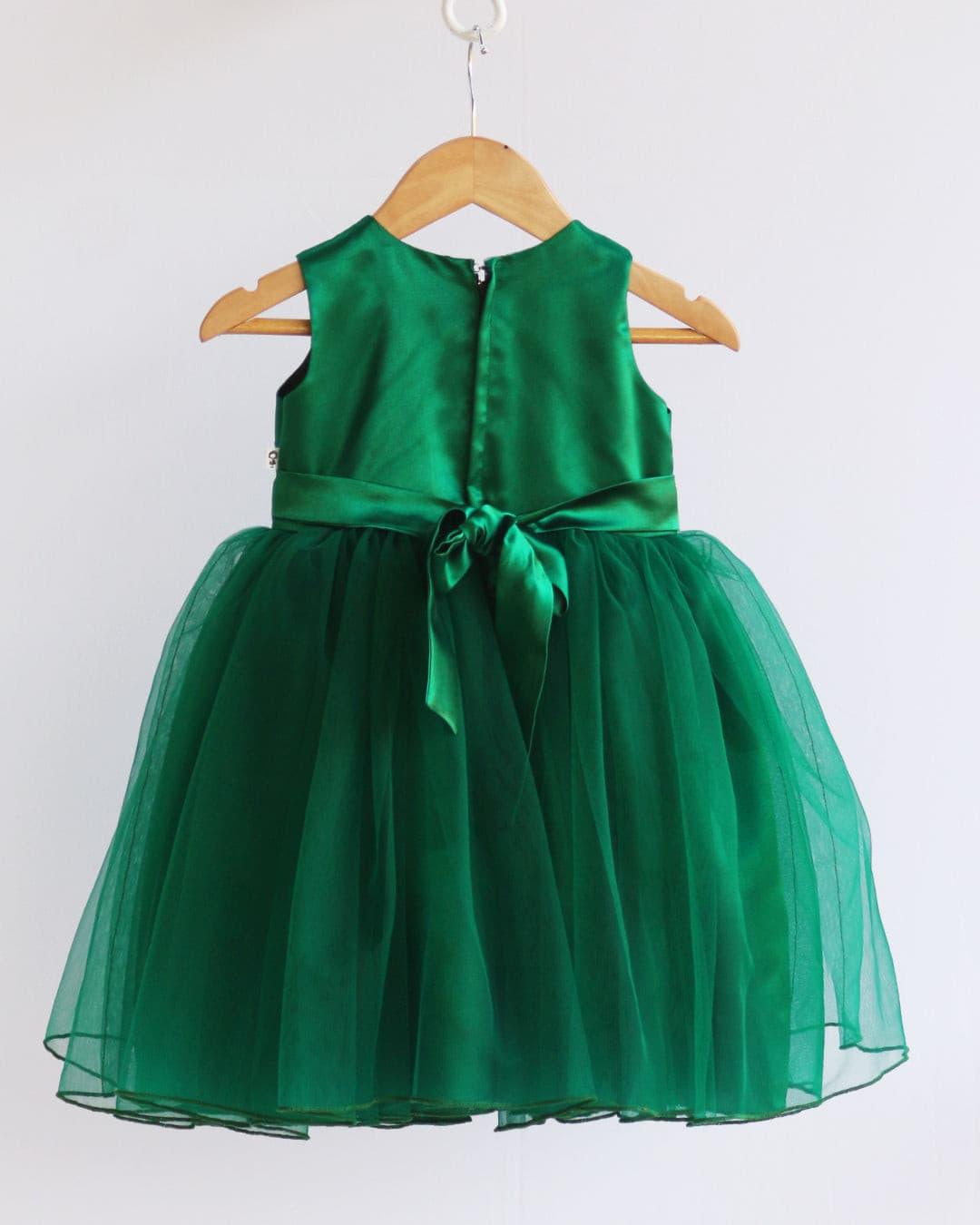 Bottle Green Handwork Sleeveless Knee length Frock
Material: Bottle green nylon mono net with handwork on neck and yoke side. Premium matching colour ultra satin is used as lining. Inner portion is covered with prem