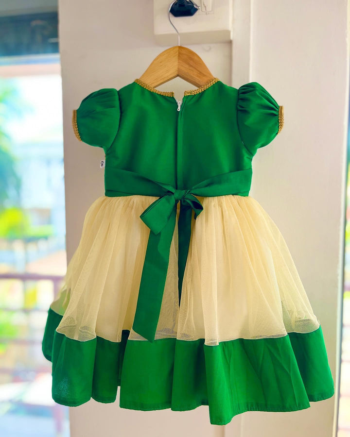 Cream & Green Traditional Embroidery Stone work Frock
Material: Green Taffetta silk top with golden embroidery stone work, Cream soft net skirt with matching border. Beautifully designed outfit for baby girls with smoo