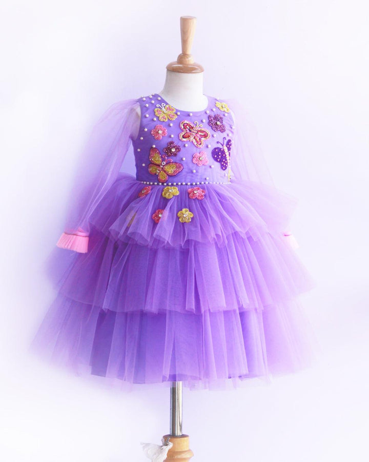 Lavender Butterfly Applique step Frock.
Material: Lavender Shade Butterfly Applique three step frock.Premium quality lilac colour satin is used as the lining and lavender colour nylon net is used in three
