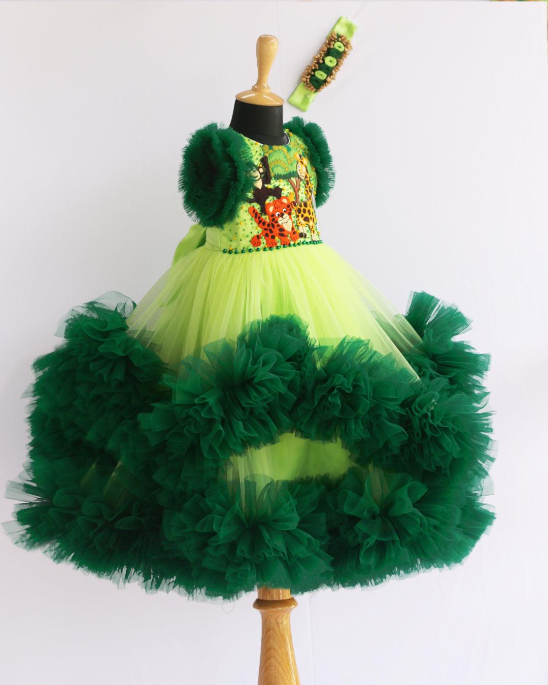 Lime Green & Dark green Animal Theme Jungle Frock
Material: Lime Green &amp; Dark Green Animal Theme Jungle Frock is made with soft nylon mono net with two layered and ruffles on each end portion. Yoke portion is d
