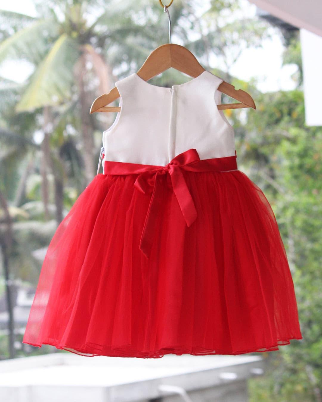 Red Colour Premium Thread Embroidery Frock.
Fabric: Bright Red mono net with premium same colour thread work detailing on the yoke portion  Beautifully designed outfit for Baby girls with smooth lining for co