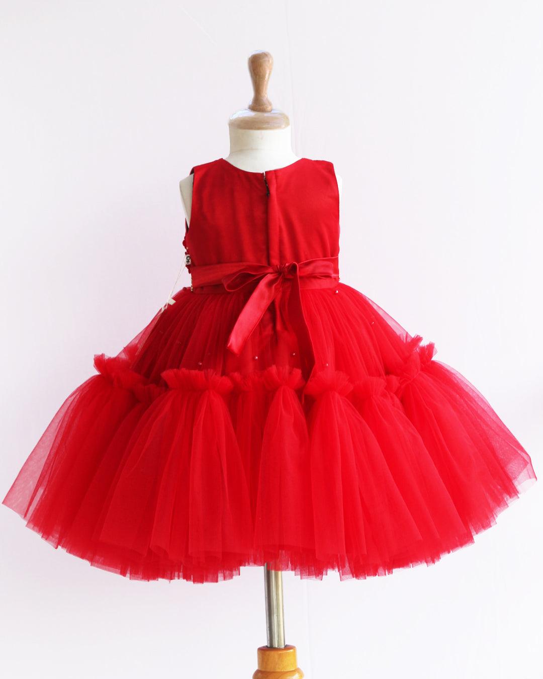 Red Shade Pleated Ruffled Layer Frock
Material: Red colour layered frock.Upper portion of the frock is done with pleated net and same colour. Cute flowers are attached on the both sides of the dress. Fo
