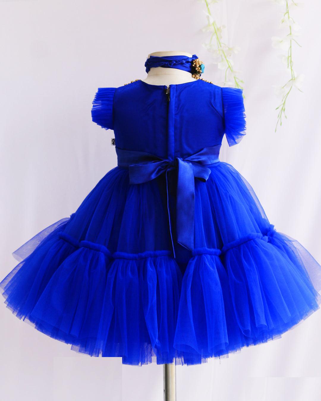 Royalblue Shade Handwork Flower Frock
Material:  Royalblue shade mono nylon net fabric with premium glossy satin as lining. Inner portion is covered with premium ultra satin and white cotton lining. cen