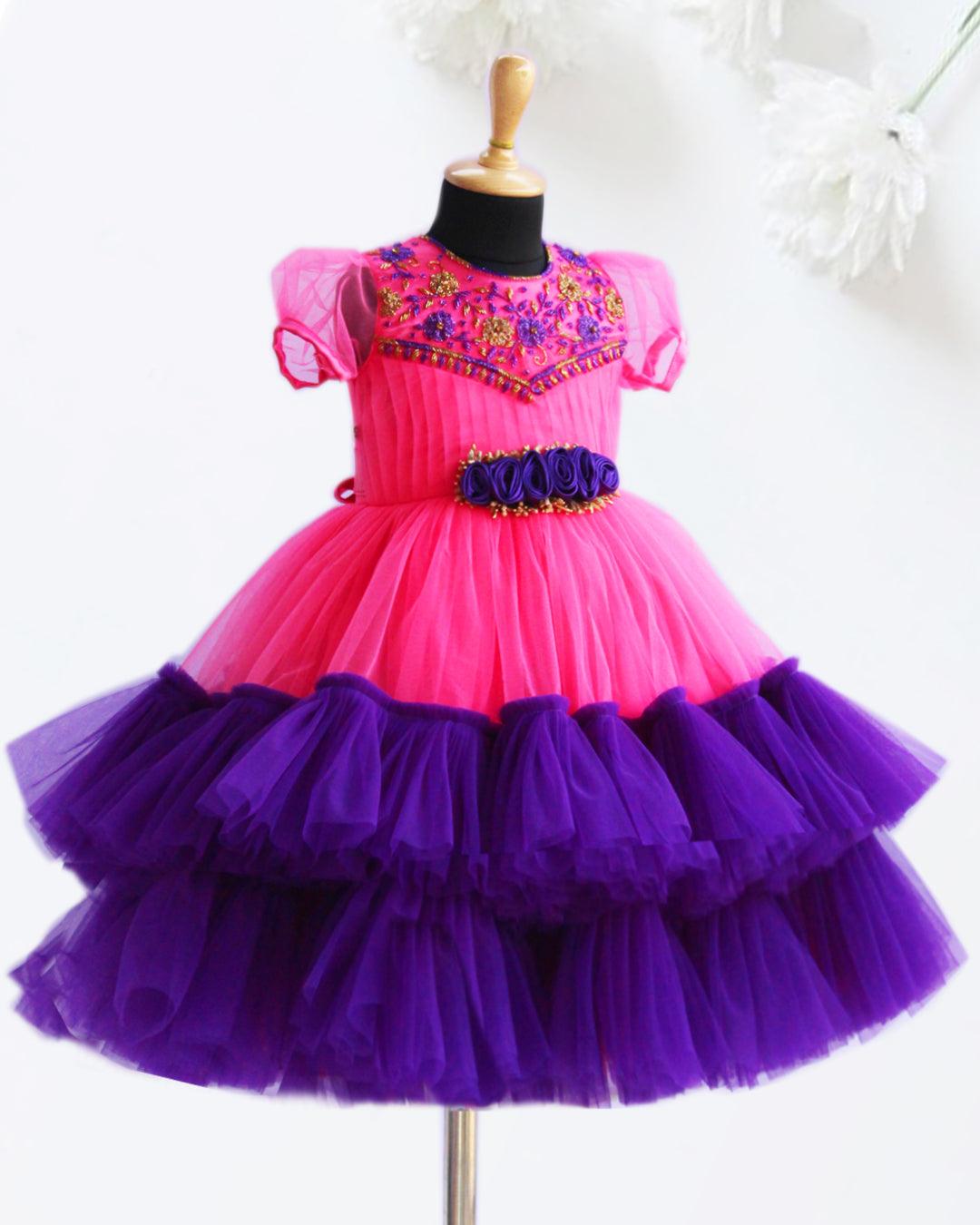 Peach & Violet combo Handwork Ruffles Party wear Frock
Material: Peach colour nylon net material is used as pleated design in the yoke portion with Heavy quality ultra satin as the primary lining .This satin lining give